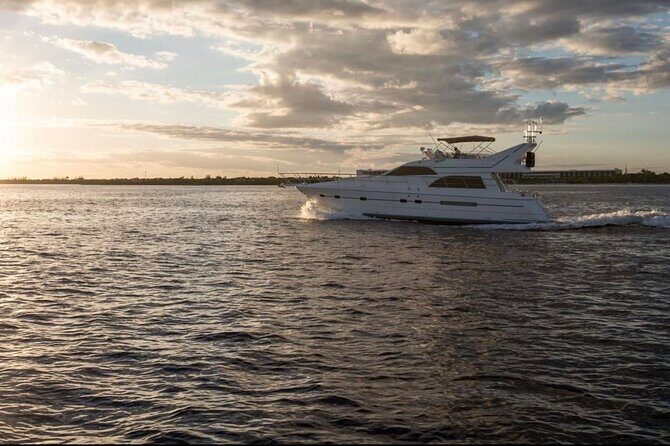 2 Hour Sunset- 60' Neptunus Tulum, Playa del Carmen, Riviera Maya - Where you meet: H2OH Sun Cruises in Puerto Aventuras