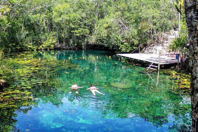 4 Private Cenotes, Zip-Lines, Canoes & Mayan Village with Delicious Lunch - Tankah Beach stop: zip-lines, canoeing, cliff jump, and snorkeling