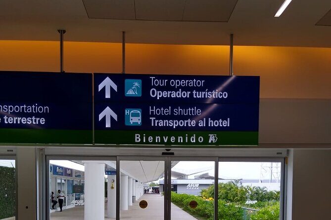 Airport Transfers to Puerto Aventuras - Private van (ROUND TRIP) FLAT RATE - Landing and meeting your driver: what happens at the airport