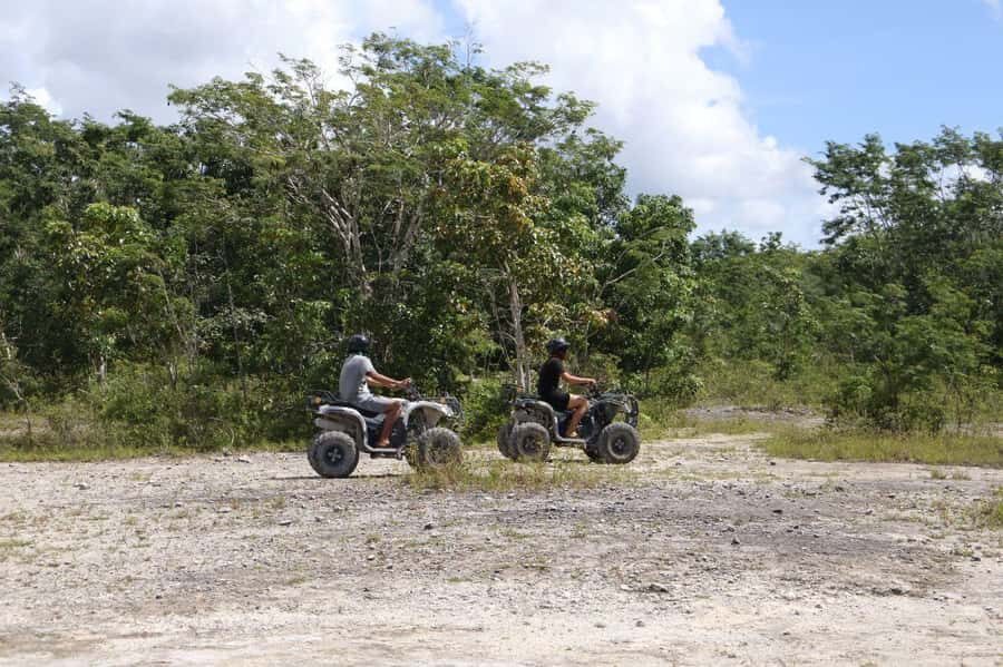 ATV Adventour: Cenote Caverna Jade, Transportation & Tequila - ATV biking in Cozumel jungle trails: the adrenaline part