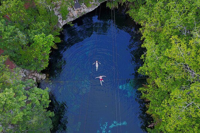 Cenotes Private Tour VIP - Stop 1: Yal-ku Lagoon open-sky cenote (your first hour of water time)
