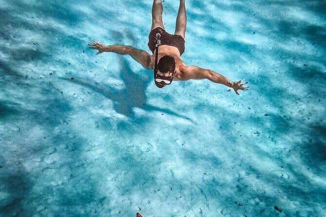 Cozumel Catamaran Tour: Snorkel at Top Reefs & Open Bar - El Cielito Beach: lunch, unlimited adult drinks, and live entertainment