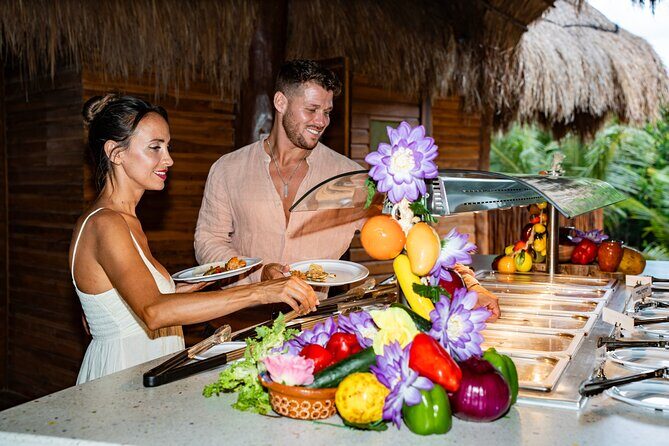 Cozumel: KUZÁ Beach Pass with Buffet, Open Bar & Activities - Check-in and first impressions: Wristband access and the park layout