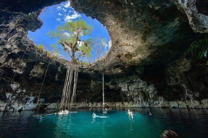 Hubiku & Ikkil Cenote, Valladolid and Chichen Itza! Deluxe From Playa Del Carmen - Valladolid: stone center, an underground light portal, and a quick buffet pause
