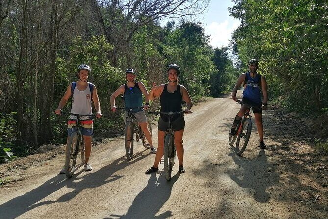 Jungle Bike Tour from Playa del Carmen with Bath in a Cenote - Cenote swimming: crystal water cavern time, plus jump guidance