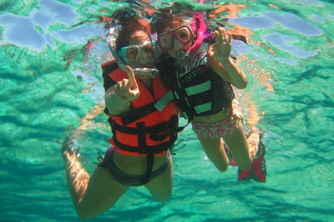 Official Chankanaab Beach Park Day pass with Snorkel - The Chankanaab beach setup: palapas, hammocks, showers, lockers