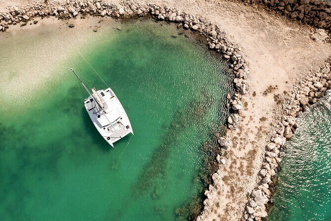 Private 40' Bali Catamaran – Drinks & Food Included - Snorkeling Equipment Included at the Mexican Caribbean Reef