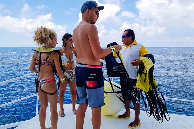 Tour to Cozumel by Catamaran with Snorkeling and Buffet Lunch - Getting There: Playa del Carmen Ferry to Cozumel Calica