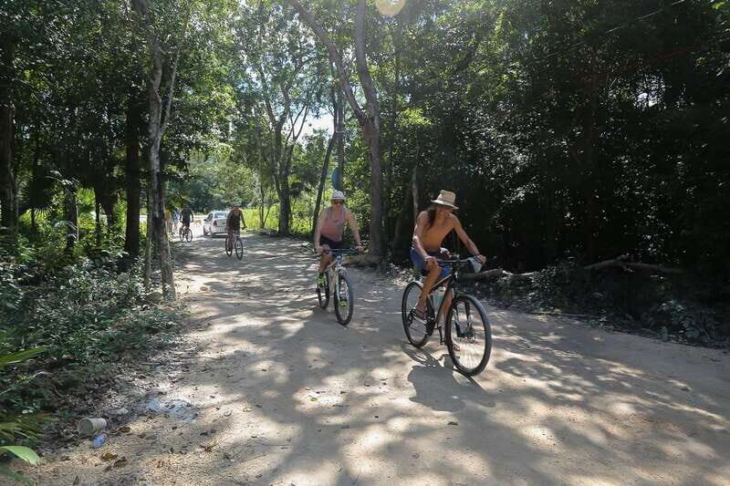 Tulum: Guided Bike Tour of Tulum Ruins, Tacos & Cenote - Cenote swim time: cooling off with jumps and underground stories