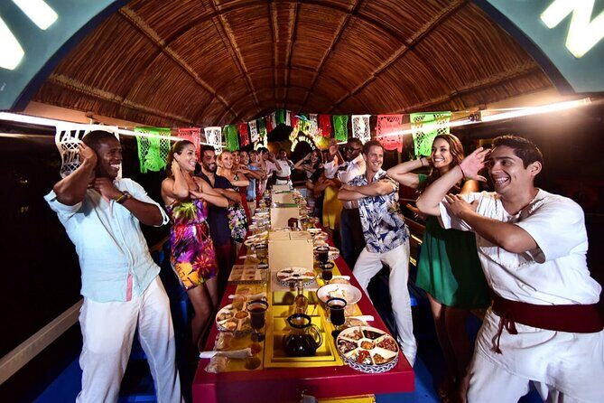 Xoximilco Night Cruise With Round Transportation from Tulum City - First Half on the Water: Food, Games, and Settling In